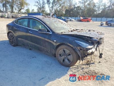 Czwarte zdjęcie samochodu z boku: 2018 TESLA MODEL 3 VIN:5YJ3E1EB7JF127958 - miniatura