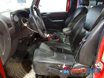 Zdjęcie 7 z 13 samochodu: 2014 JEEP WRANGLER UNLIMITED SAHARA VIN:1C4HJWEG1EL324346 - miniatura