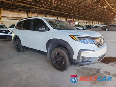 Czwarte zdjęcie samochodu z boku: 2022 HONDA PILOT TRAILSPORT VIN:5FNYF6H84NB031534 - miniatura