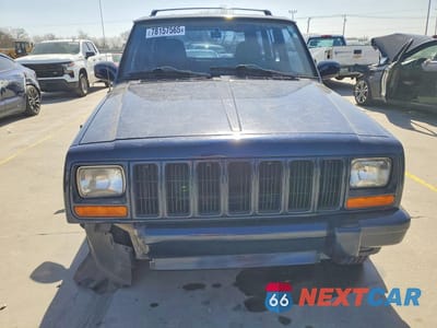 Piąte zdjęcie samochodu w środku: 2001 JEEP CHEROKEE SPORT VIN:1J4FT48S41L588073 - miniatura