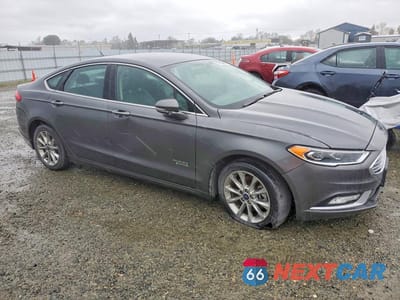Czwarte zdjęcie samochodu z boku: 2017 FORD FUSION SE PHEV VIN:3FA6P0PU5HR330166 - miniatura