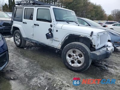 Czwarte zdjęcie samochodu z boku: 2015 JEEP WRANGLER UNLIMITED SAHARA VIN:1C4BJWEGXFL742668 - miniatura