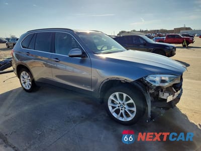 Czwarte zdjęcie samochodu z boku: 2016 BMW X5 SDRIVE35I VIN:5UXKR2C50G0R69288 - miniatura
