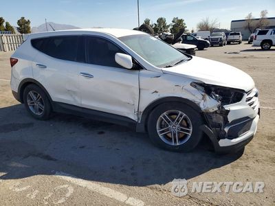 Czwarte zdjęcie samochodu z boku: 2018 HYUNDAI SANTA FE SPORT VIN:5XYZT3LB6JG560601 - miniatura