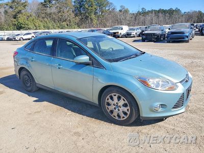 Czwarte zdjęcie samochodu z boku: 2012 FORD FOCUS SE VIN:1FAHP3F21CL319117 - miniatura