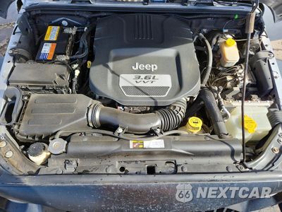 Zdjęcie 12 z 14 samochodu: 2013 JEEP WRANGLER UNLIMITED SPORT VIN:1C4BJWDG0DL669440 - miniatura