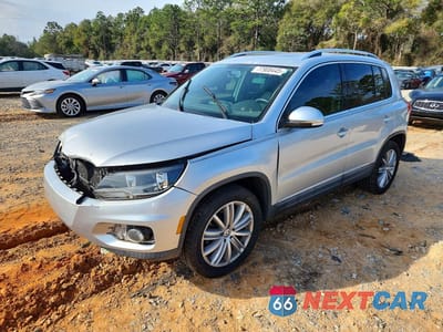 2014 VOLKSWAGEN TIGUAN S WVGAV3AX3EW568181 - główne zdjęcie licytacji z USA - miniatura