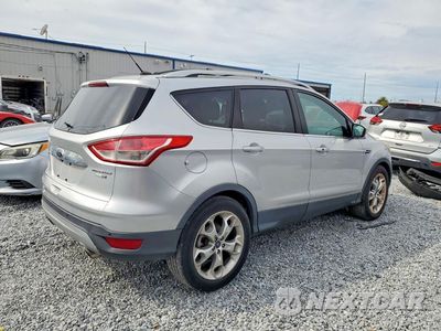 Trzecie zdjęcie samochodu z tyłu: 2014 FORD ESCAPE TITANIUM VIN:1FMCU9J97EUD94174 - miniatura