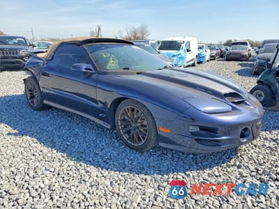 Czwarte zdjęcie samochodu z boku: 2001 PONTIAC FIREBIRD TRANS AM VIN:2G2FV32G612145698 - miniatura