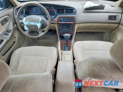 Zdjęcie 8 z 12 samochodu: 1998 NISSAN ALTIMA 4D VIN:1N4DL01D3WC108927 - miniatura