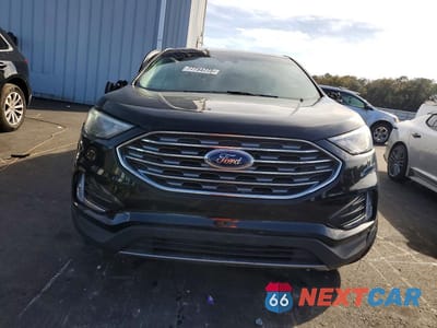 Piąte zdjęcie samochodu w środku: 2022 FORD EDGE TITANIUM VIN:2FMPK4K93NBB00199 - miniatura