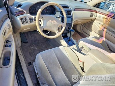 Zdjęcie 8 z 11 samochodu: 2001 TOYOTA CAMRY SOLARA SE VIN:2T1CF22P11C422657 - miniatura