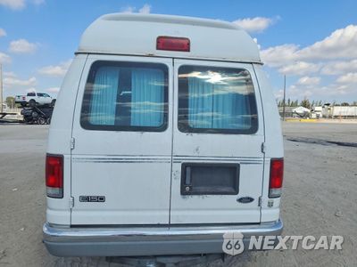 Zdjęcie 6 z 14 samochodu: 1999 FORD ECONOLINE E150 VAN VIN:1FDRE14W3XHB49202 - miniatura
