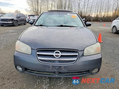 Piąte zdjęcie samochodu w środku: 2003 NISSAN MAXIMA GLE VIN:JN1DA31A33T426049 - miniatura