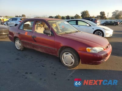 Czwarte zdjęcie samochodu z boku: 1999 TOYOTA COROLLA VE VIN:1NXBR12E6XZ241556 - miniatura