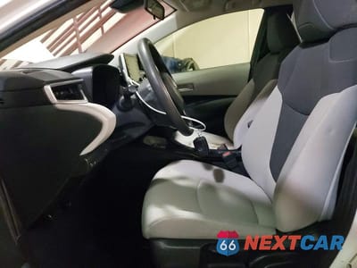 Zdjęcie 7 z 11 samochodu: 2021 TOYOTA COROLLA LE VIN:JTDEAMDE2MJ003918 - miniatura