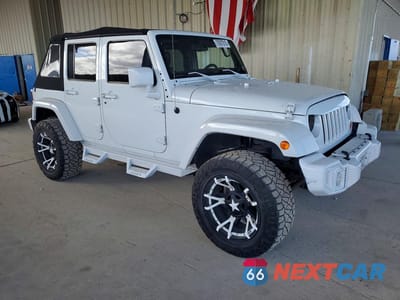 Czwarte zdjęcie samochodu z boku: 2013 JEEP WRANGLER UNLIMITED SAHARA VIN:1C4BJWEG1DL613053 - miniatura