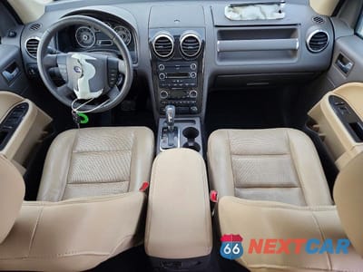 Zdjęcie 8 z 12 samochodu: 2008 FORD TAURUS X SEL VIN:1FMDK05W78GA33844 - miniatura