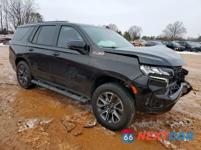 Czwarte zdjęcie samochodu z boku: 2021 CHEVROLET TAHOE K1500 Z71 VIN:1GNSKPKD9MR317571 - miniatura