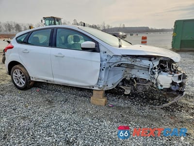 Czwarte zdjęcie samochodu z boku: 2018 FORD FOCUS SE VIN:1FADP3K29JL329525 - miniatura