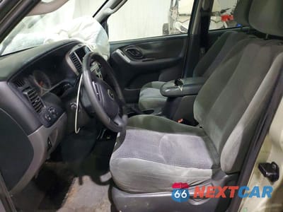 Zdjęcie 7 z 12 samochodu: 2003 MAZDA TRIBUTE LX VIN:4F2YZ94193KM56104 - miniatura