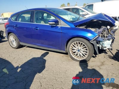 Czwarte zdjęcie samochodu z boku: 2012 FORD FOCUS SEL VIN:1FAHP3M28CL362579 - miniatura