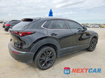 Trzecie zdjęcie samochodu z tyłu: 2022 MAZDA CX-30 PREFERRED VIN:3MVDMBCL2NM417873 - miniatura