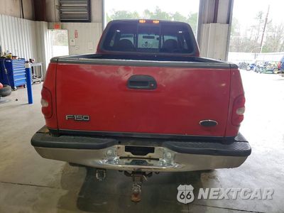Zdjęcie 6 z 12 samochodu: 2000 FORD F150 VIN:1FTRX08L0YKA25949 - miniatura