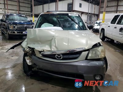 Piąte zdjęcie samochodu w środku: 2003 MAZDA TRIBUTE LX VIN:4F2YZ94193KM56104 - miniatura