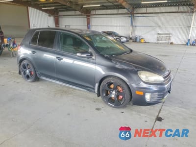 Czwarte zdjęcie samochodu z boku: 2012 VOLKSWAGEN GOLF VIN:WVWGV7AJ7CW163097 - miniatura