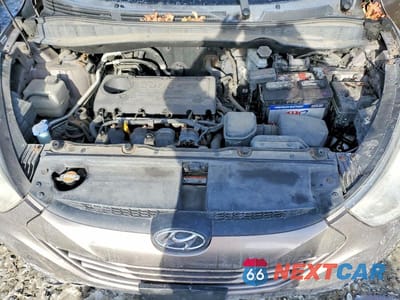 Zdjęcie 12 z 13 samochodu: 2010 HYUNDAI TUCSON GLS VIN:KM8JU3AC0AU018281 - miniatura