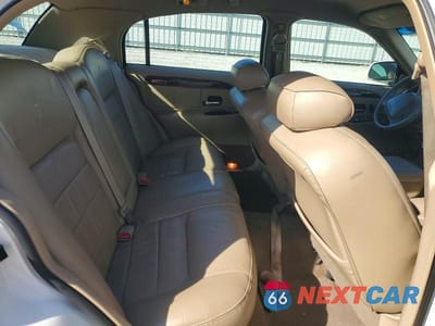 Zdjęcie 10 z 13 samochodu: 2000 LINCOLN TOWN CAR SIGNATURE VIN:1LNHM82W6YY887586 - miniatura