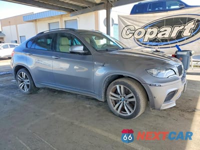 Czwarte zdjęcie samochodu z boku: 2011 BMW X6 M VIN:5YMGZ0C50BLK13891 - miniatura
