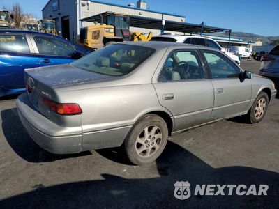 Trzecie zdjęcie samochodu z tyłu: 1999 TOYOTA CAMRY XLE V6 VIN:JT2BF28KXX0213940 - miniatura