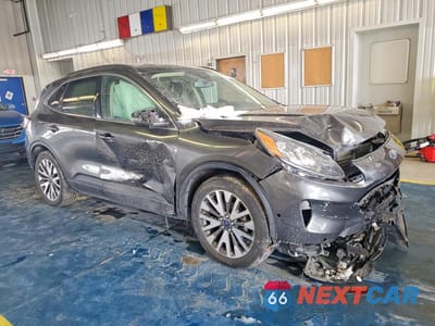 Czwarte zdjęcie samochodu z boku: 2020 FORD ESCAPE TITANIUM VIN:1FMCU9J97LUB15223 - miniatura