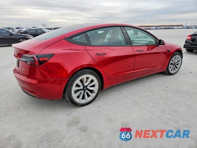 Trzecie zdjęcie samochodu z tyłu: 2021 TESLA MODEL 3 VIN:5YJ3E1EB4MF859680 - miniatura
