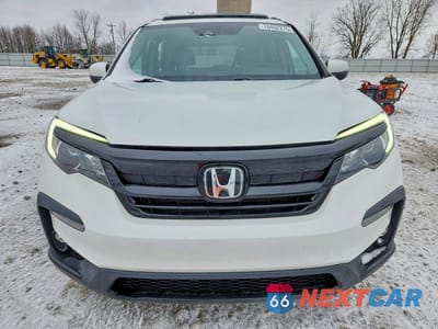 Piąte zdjęcie samochodu w środku: 2021 HONDA PILOT SE VIN:5FNYF6H26MB095780 - miniatura