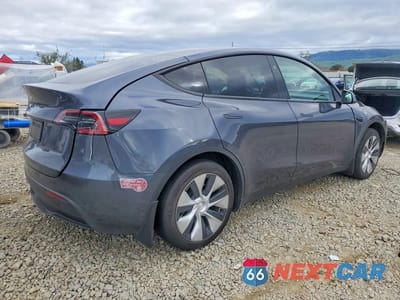 Trzecie zdjęcie samochodu z tyłu: 2023 TESLA MODEL Y VIN:7SAYGDED4PF971843 - miniatura