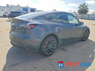 Trzecie zdjęcie samochodu z tyłu: 2022 TESLA MODEL Y VIN:7SAYGDEFXNF443819 - miniatura