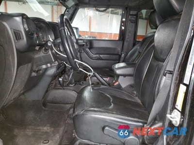 Zdjęcie 7 z 11 samochodu: 2017 JEEP WRANGLER UNLIMITED SAHARA VIN:1C4BJWEG0HL660547 - miniatura