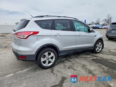 Trzecie zdjęcie samochodu z tyłu: 2013 FORD ESCAPE SE VIN:1FMCU9G93DUD88524 - miniatura