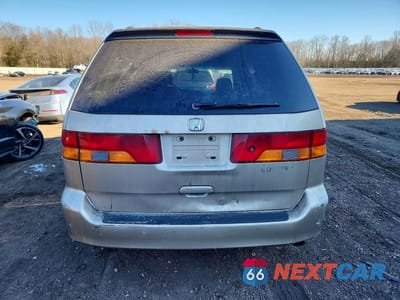 Zdjęcie 6 z 13 samochodu: 2002 HONDA ODYSSEY EXL VIN:2HKRL18002H560048 - miniatura