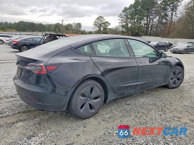 Trzecie zdjęcie samochodu z tyłu: 2021 TESLA MODEL 3 VIN:5YJ3E1EA6MF086783 - miniatura