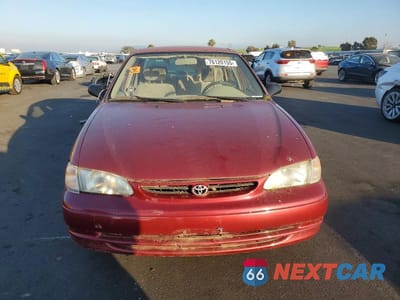 Piąte zdjęcie samochodu w środku: 1999 TOYOTA COROLLA VE VIN:1NXBR12E6XZ241556 - miniatura