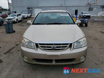 Piąte zdjęcie samochodu w środku: 2004 KIA SPECTRA LX VIN:KNAFE121345058584 - miniatura