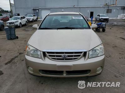 Piąte zdjęcie samochodu w środku: 2004 KIA SPECTRA LX VIN:KNAFE121345058584 - miniatura