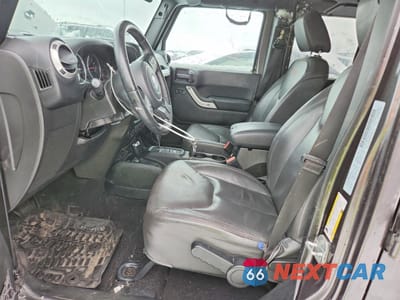 Zdjęcie 7 z 13 samochodu: 2017 JEEP WRANGLER UNLIMITED SAHARA VIN:1C4BJWEG6HL668068 - miniatura