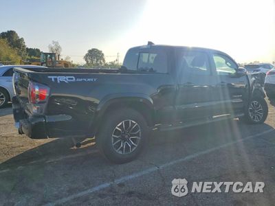 Trzecie zdjęcie samochodu z tyłu: 2022 TOYOTA TACOMA DOUBLE CAB VIN:3TMBZ5DN9NM033956 - miniatura