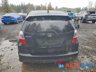 Zdjęcie 6 z 13 samochodu: 2010 HONDA FIT SPORT VIN:JHMGE8H43AC012020 - miniatura