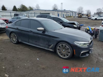 Czwarte zdjęcie samochodu z boku: 2019 BMW M550XI VIN:WBAJB9C53KB465225 - miniatura